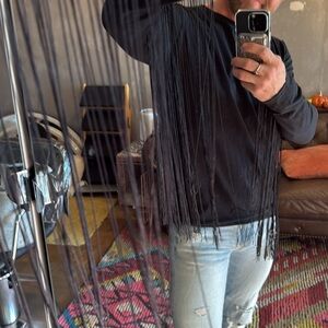 Beautiful men’s size medium long sleeve shirt with dramatic sleeve fringe